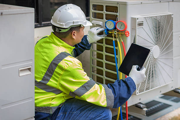 Professional Air Conditioning Repair technician working in Clear Lake, IA
